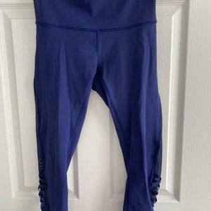 Lululemon Leggings with sheer detail on sides.
